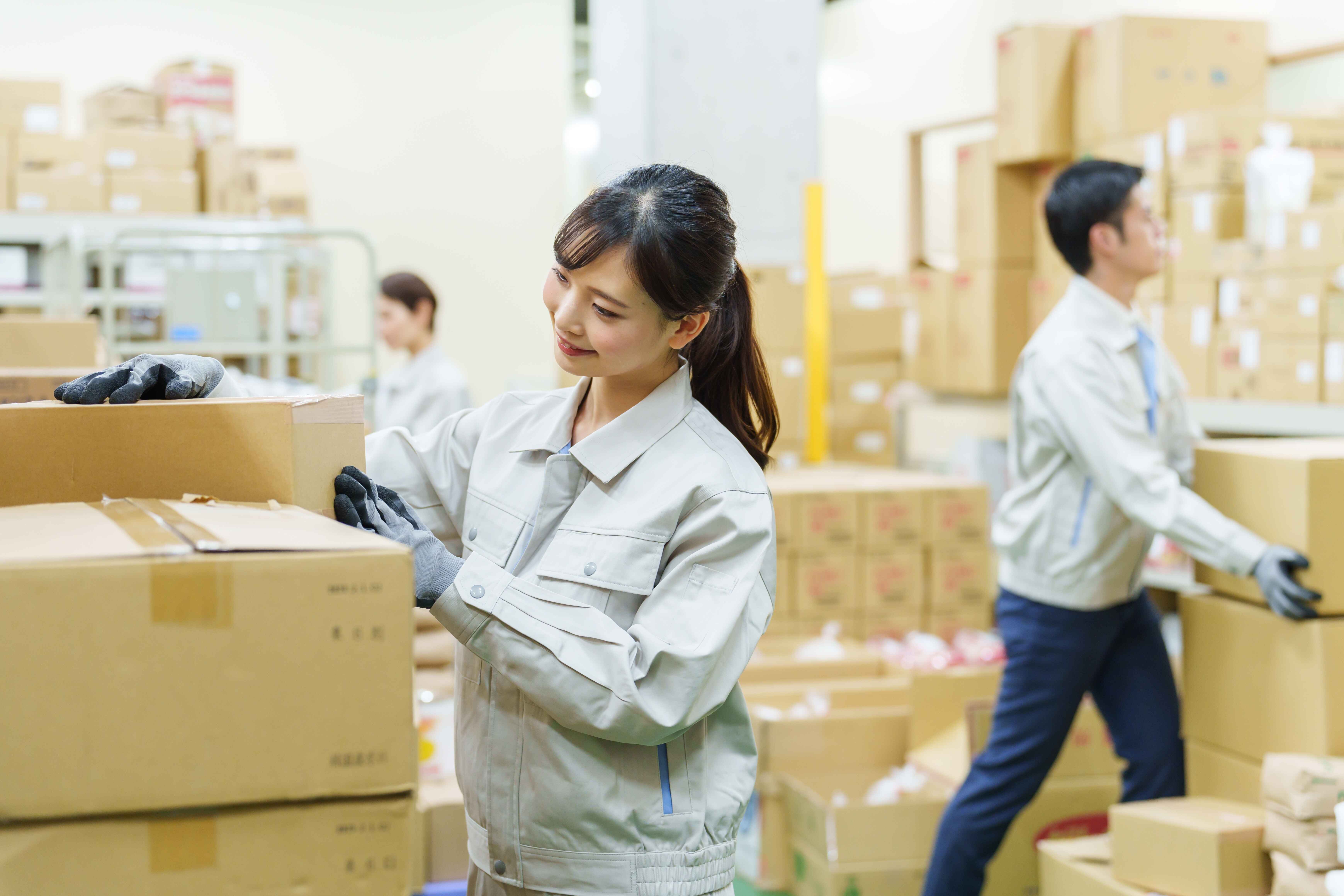 people organizing boxes
